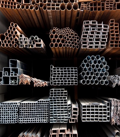 a,series,of,different,sizes,metal,pipes,on,shelf